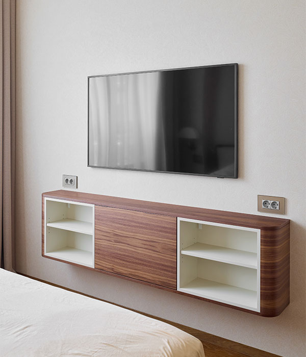 TV wall-mounted on plaster wall with a floating TV unit in London.