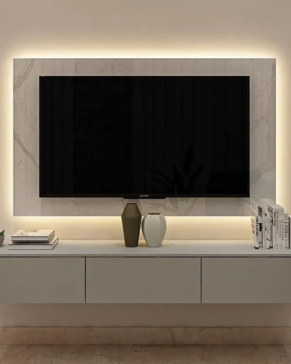 TV mounted on MDF wall with floating unit — modern London setup.