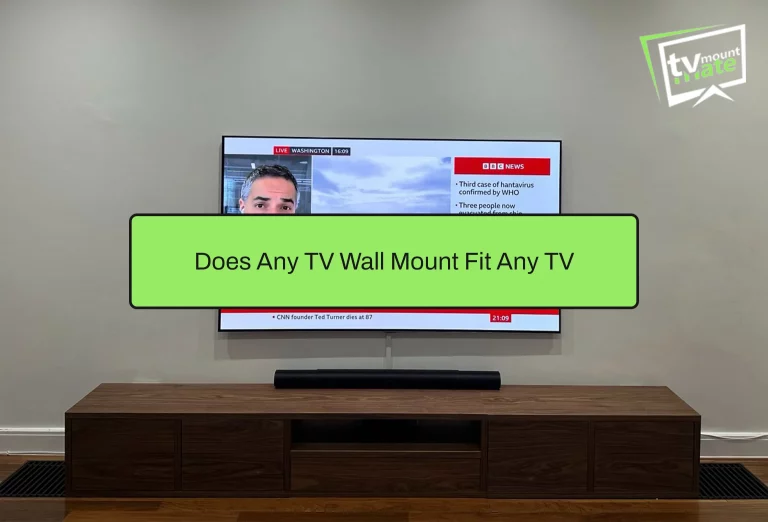Professional installer checking TV wall mount compatibility and VESA pattern before installation