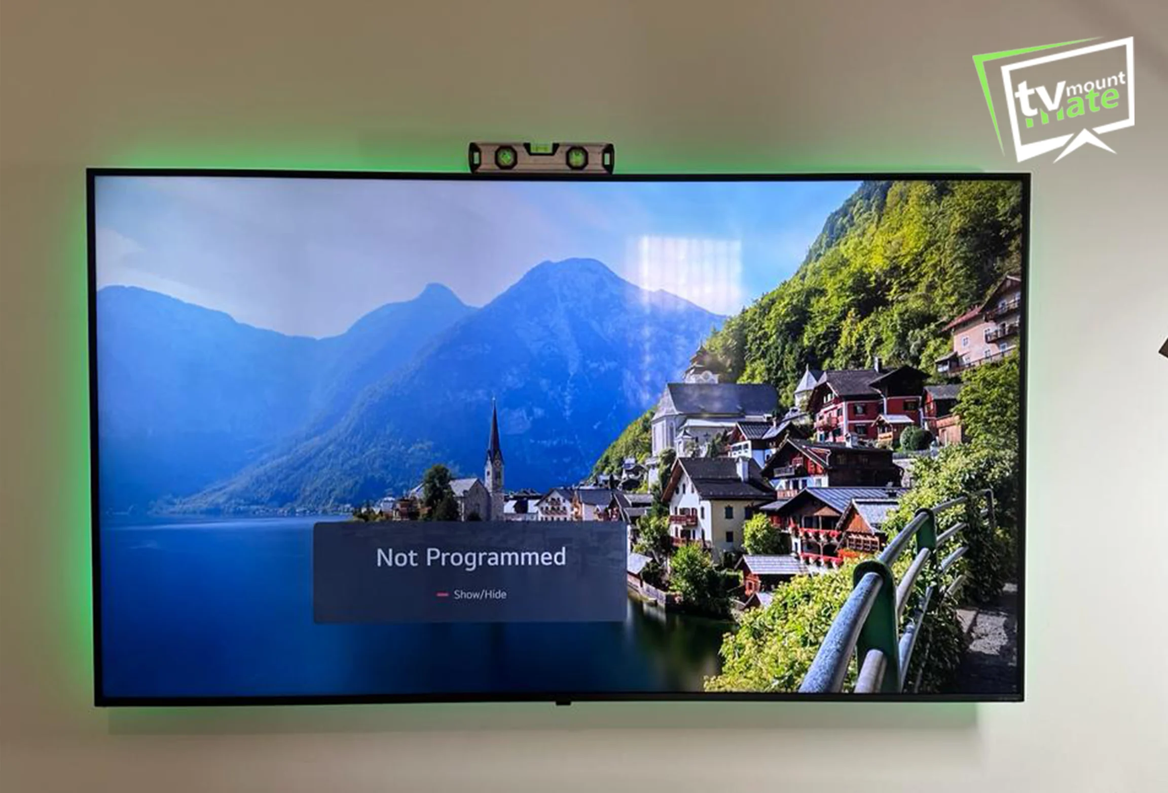 Properly secured television mounted on a wall with a stable and safe bracket installation