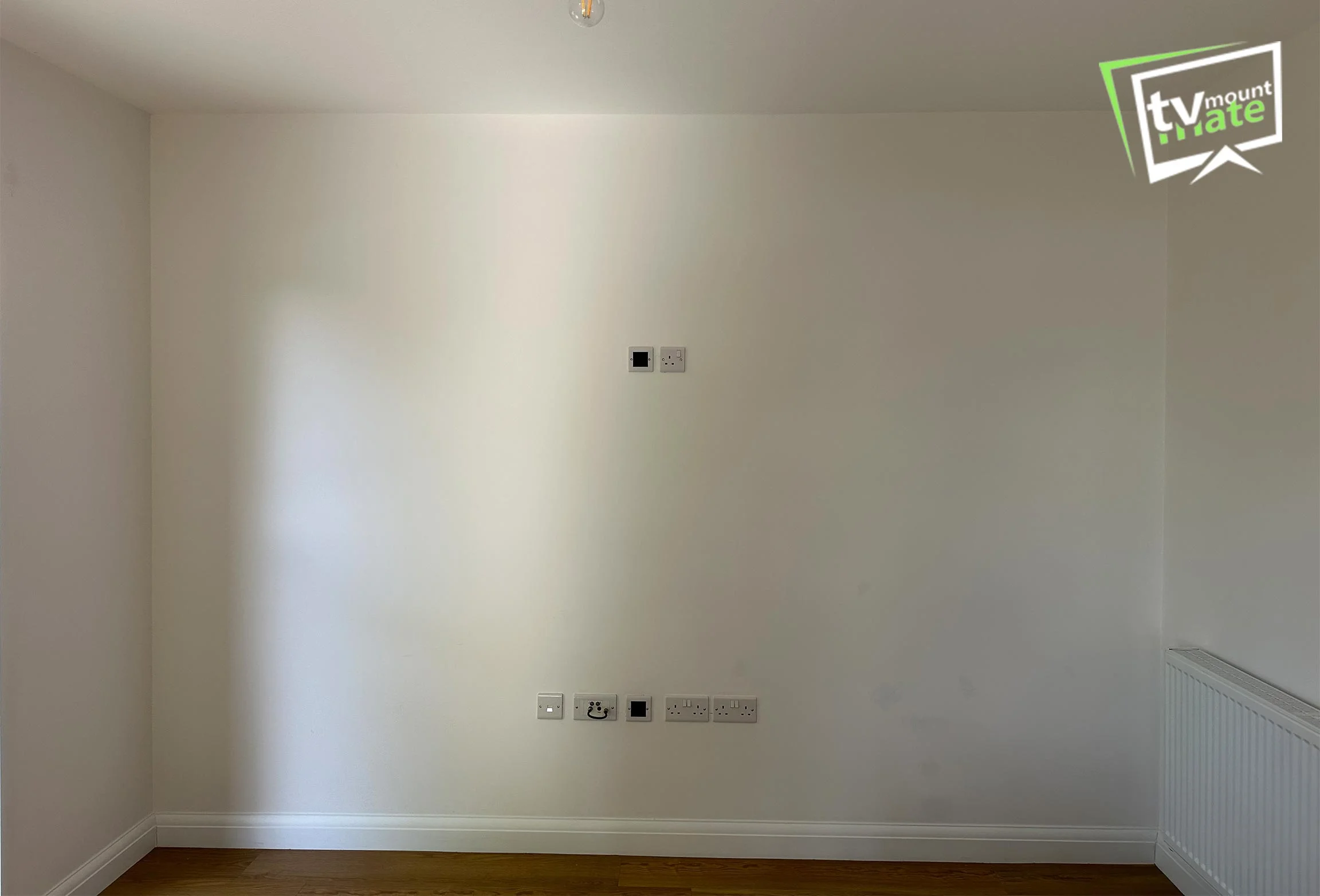 What to Check Before Mounting a TV on Any Wall? 1 Checking wall type before TV wall mounting installation on brick, plasterboard, and concrete walls in London