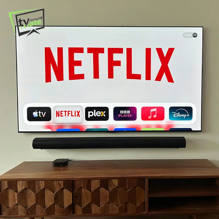 65 inch LG G5 TV mounted with Sonos Arc Ultra in Bexley