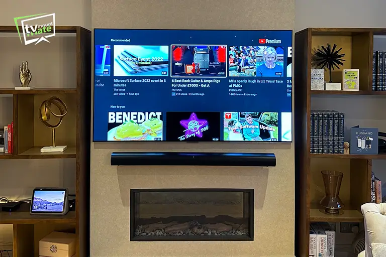 Professional soundbar installation with TV bracket setup