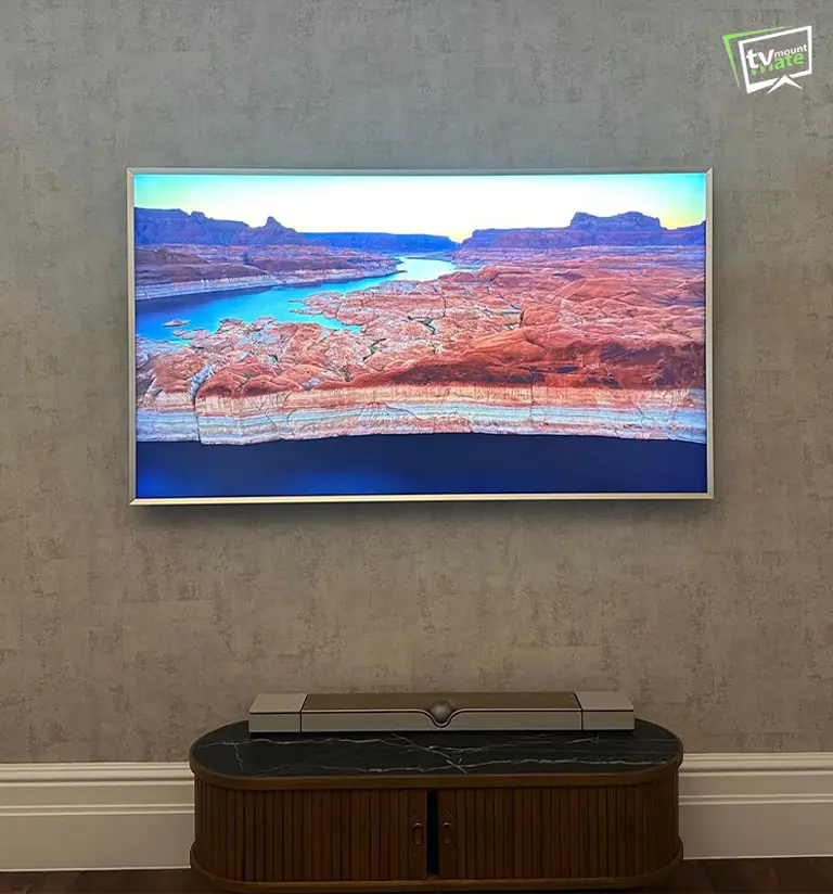 Professional TV wall mounting installation in a London living room completed personally by the owner of TV Mount Mate with concealed cables and ambient LED backlighting.
