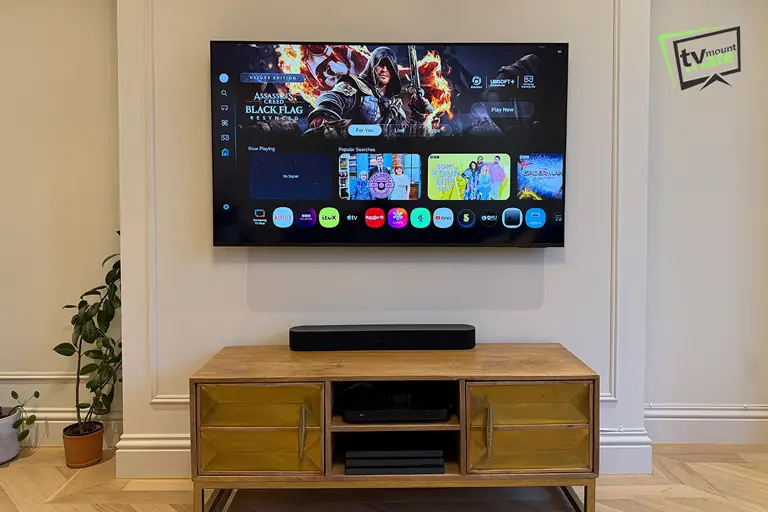 55-inch Samsung Neo QLED mounted above a cabinet within decorative wall moulding