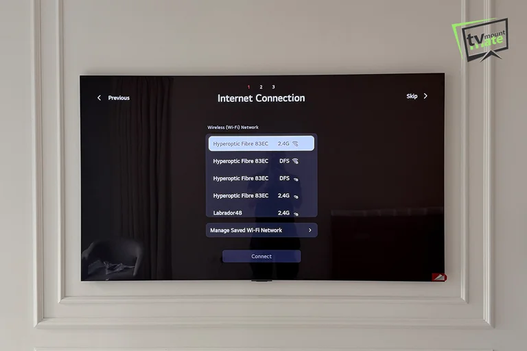 65-inch LG G6 OLED mounted inside decorative wall moulding in Battersea