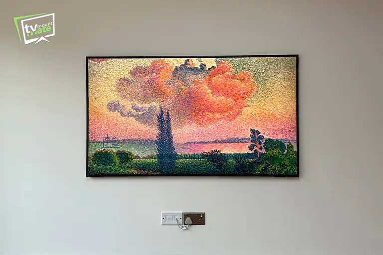75-inch Samsung Frame Pro wall mounted with no visible power cable in Muswell Hill